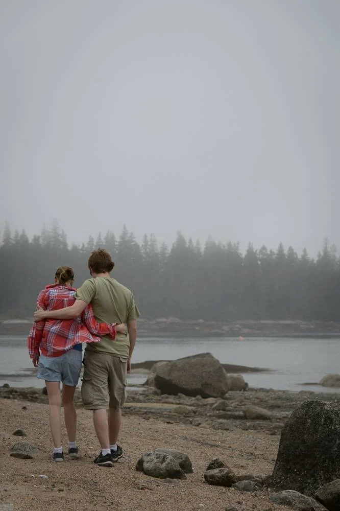 This young couple has the right idea in Maine- focus on eachother and the scenery!