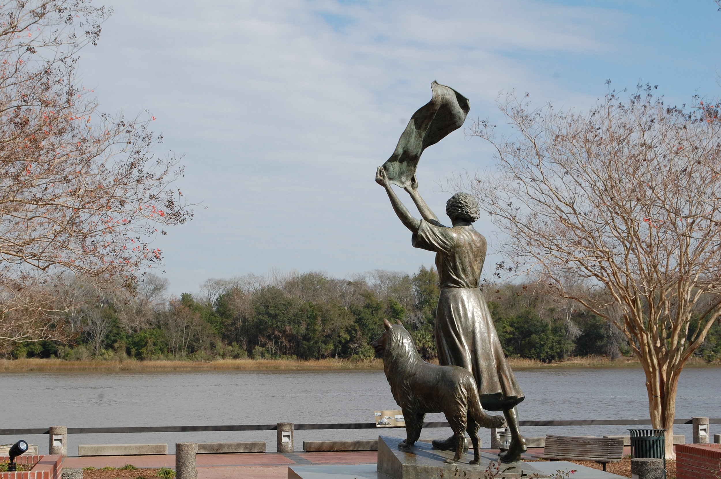 This statue is called the Waving Girl Statue on the River front. It depicts Florence Martus, whose family kept the island lighthouse, greeting sailors. 