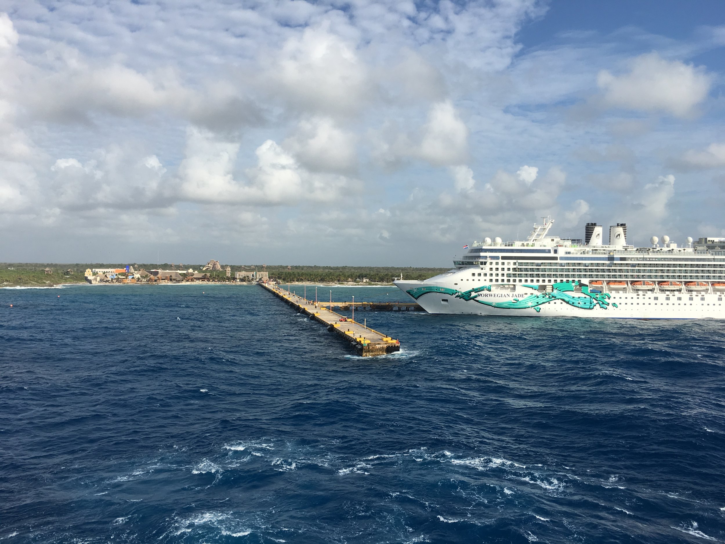 With swells coming 10-15 feet up on the side of the ship, and two ships already in the safest docking spots, the Captain decided there was no way to keep the gangway safe for passengers if we docked in Costa Maya. 