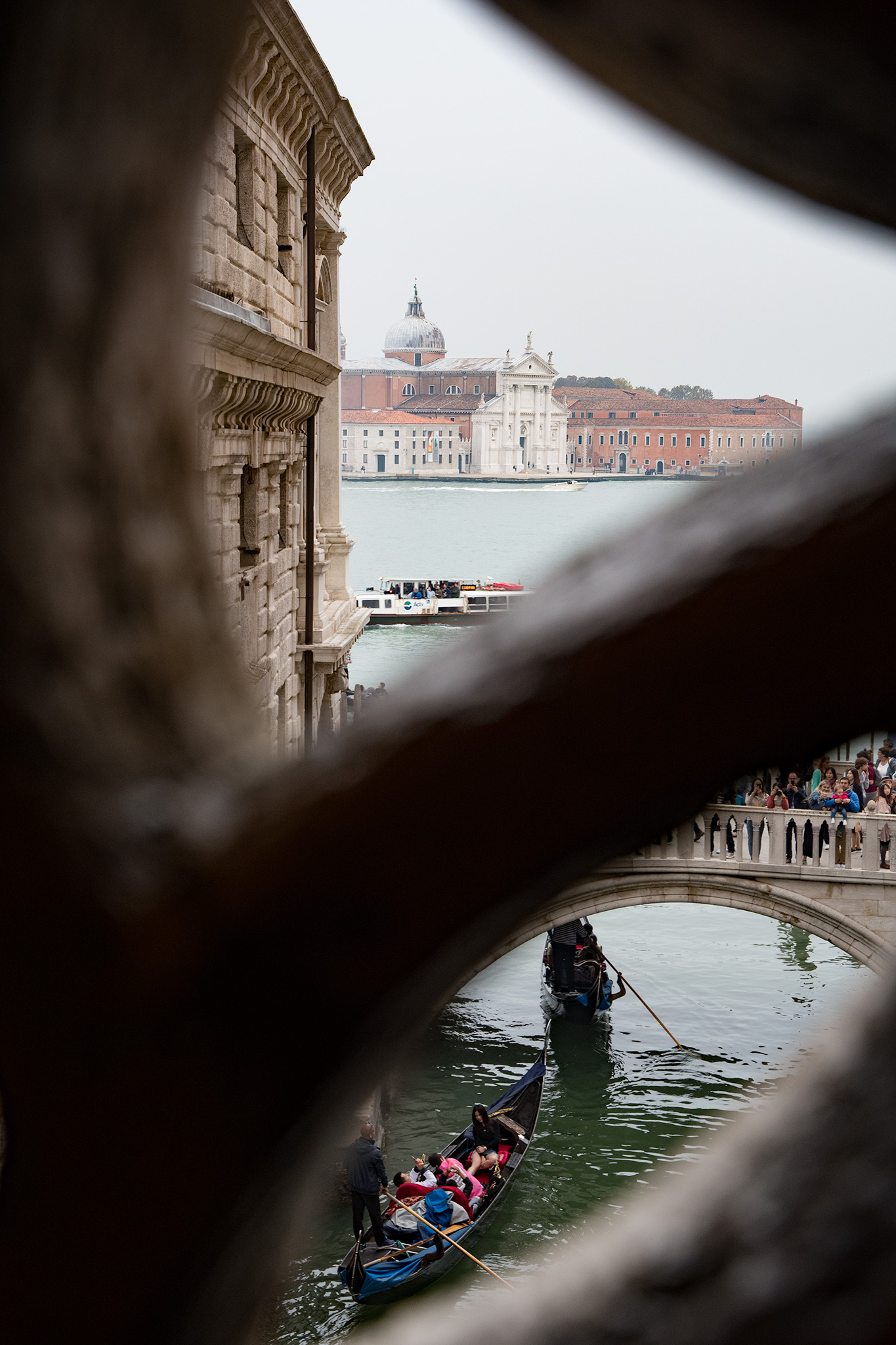 The view prisoners would have had moving from the courts in Doges Palace to the prison along the "Bridge of Sighs' Today, it's a view of dozens of tourists on Ponte della Paglia, jockeying for view of the Bridge of Sighs!