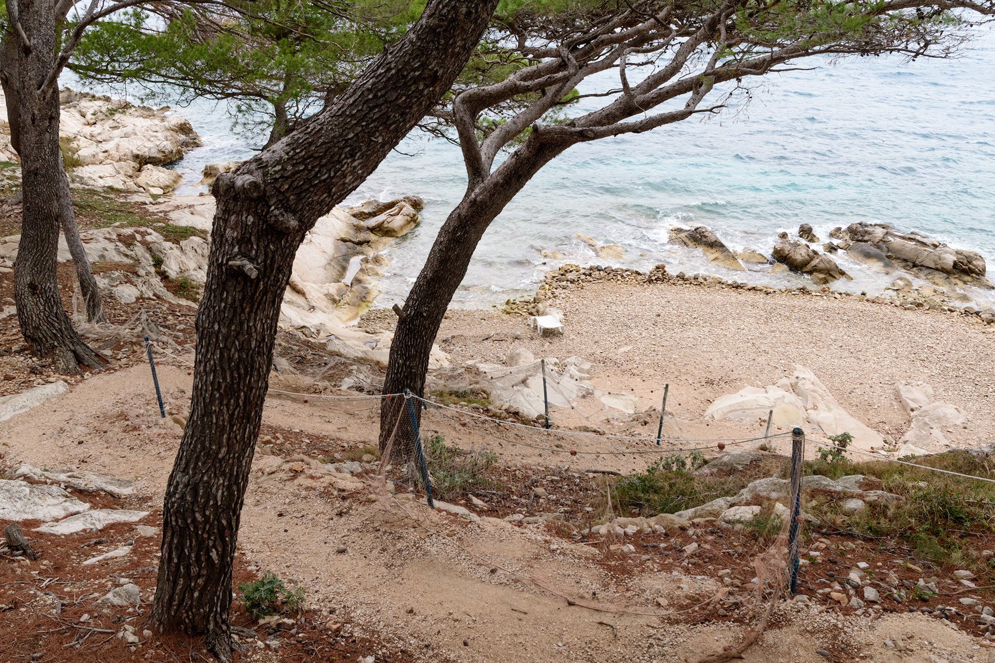 One of the rocky beaches that line Cavtat, and attract beach goers in the summer. 