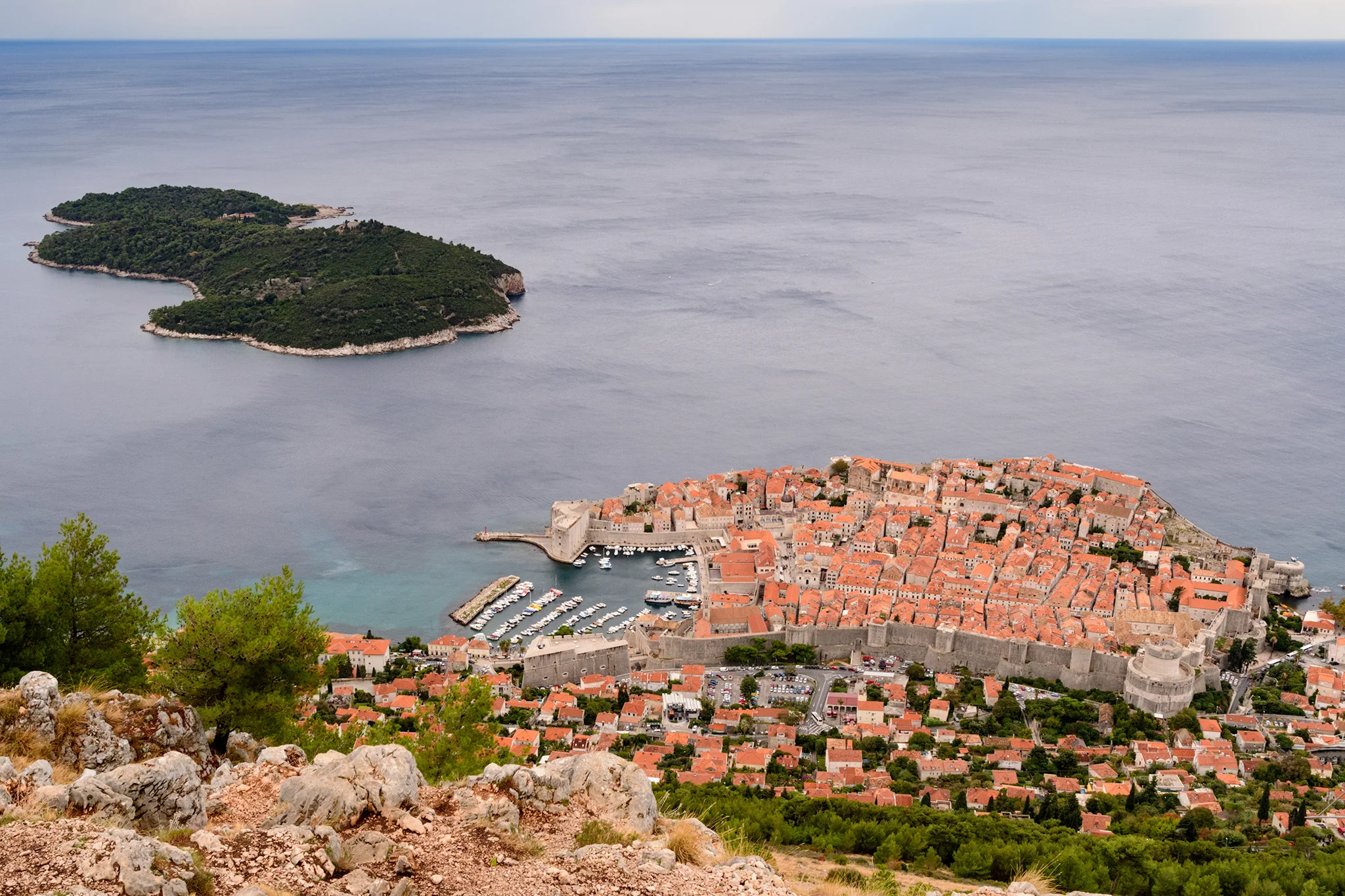 The walled city of Dubrovnik in the Adriatic with the famous red terracotta roofs. 
