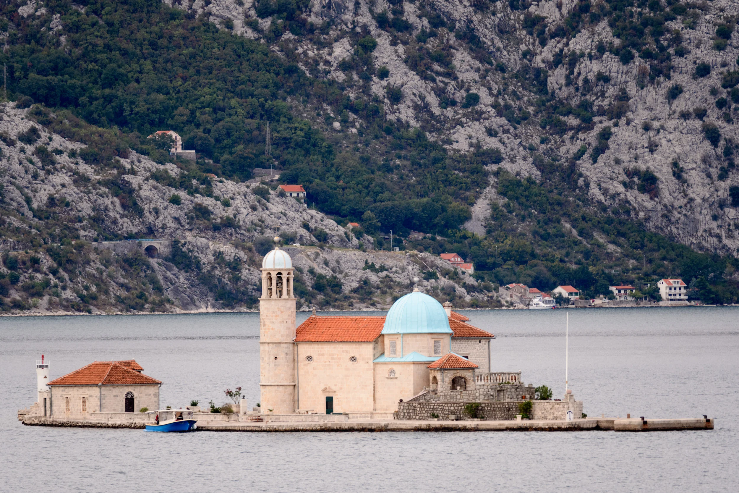 Out in the Bay of Kotor, Our Lady of the Rock can be accessed by a short inexpensive boat trip from Perast. Inside the church, you can see the Madonna and Child icon that inspired the church.