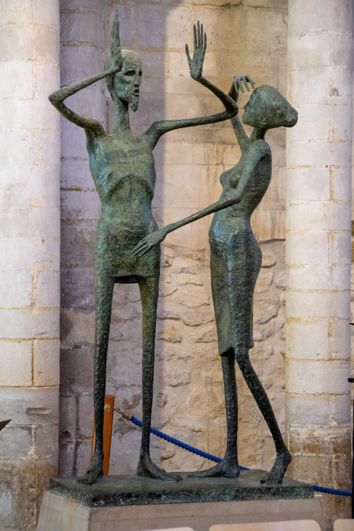 A modern sculpture of Jesus and Mary Magdalene