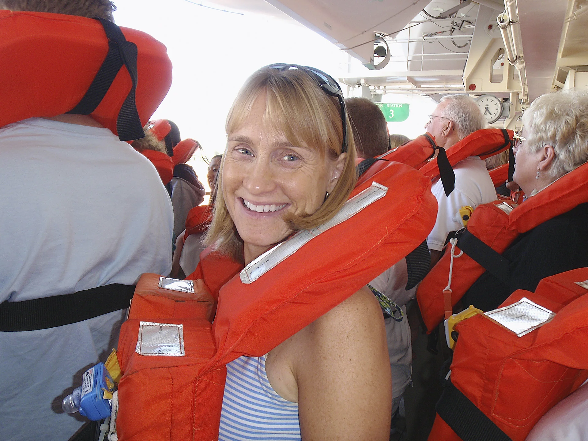Most ships no longer require you to wear your life vest to muster, but its a good idea to know where they are in your cabin before you go to muster. 
