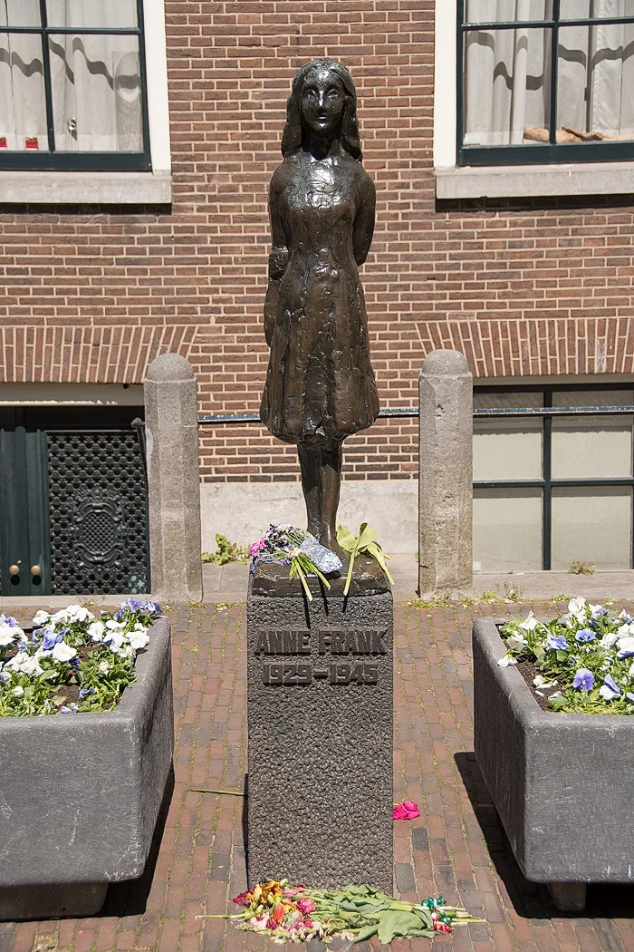 The Anne Frank Statue stands near Westermrkt
