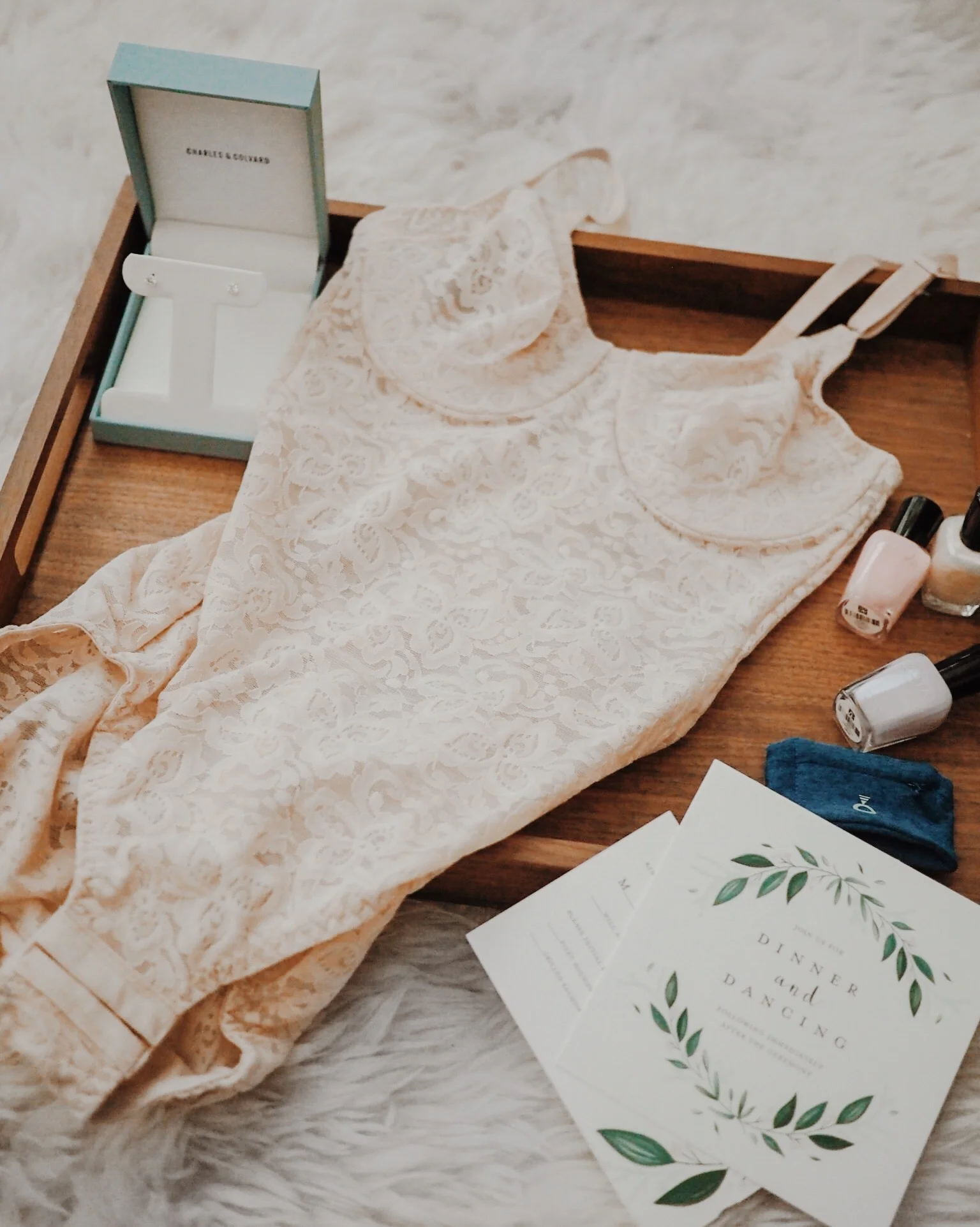 Jewelry: Charles & Colvard Moissanite Studs | Garment: Bali Lace 'N Smooth® Bodybriefer | Nail polish: Zoya | Sweatband: RingHero | Stationery: Mixbook