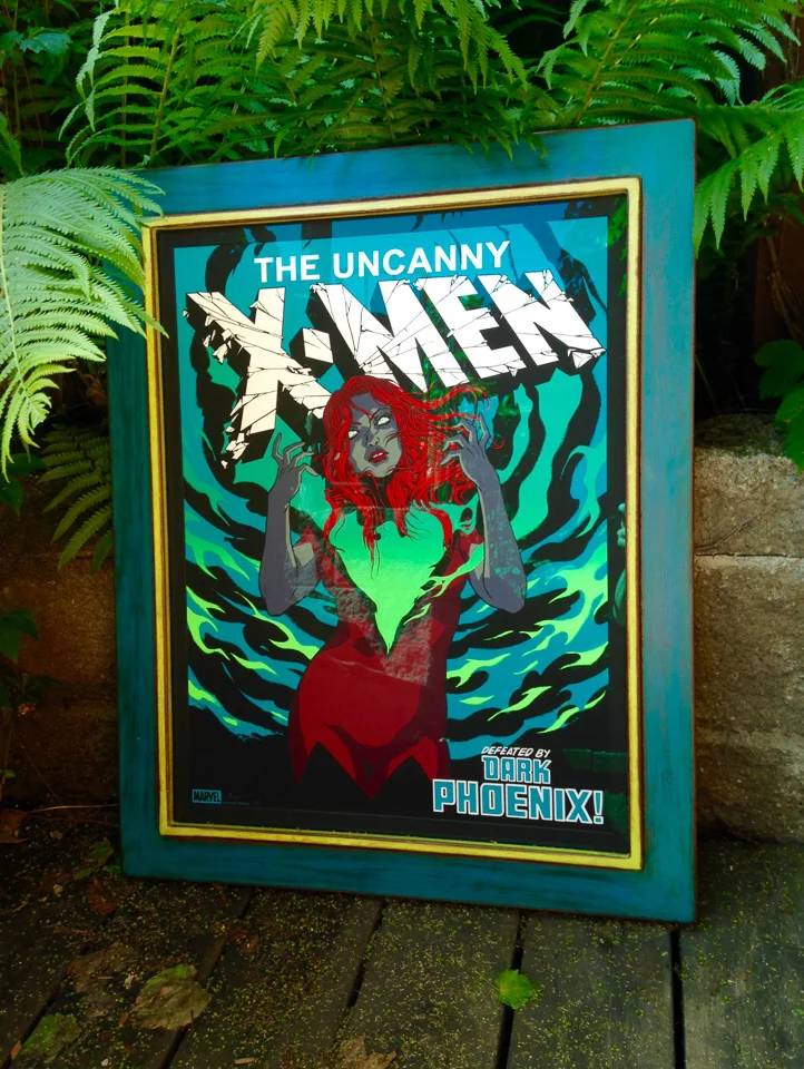 Xmen print framed in painted and rusticated steel.