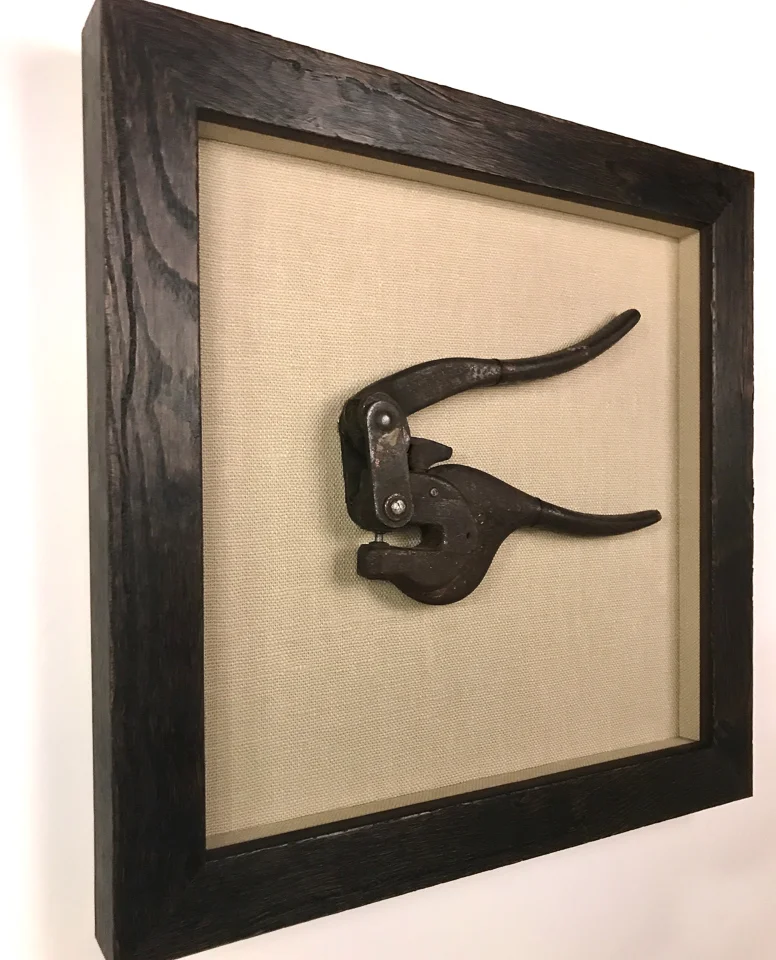 Family keepsake framed as artwork in reclaimed wood frame.