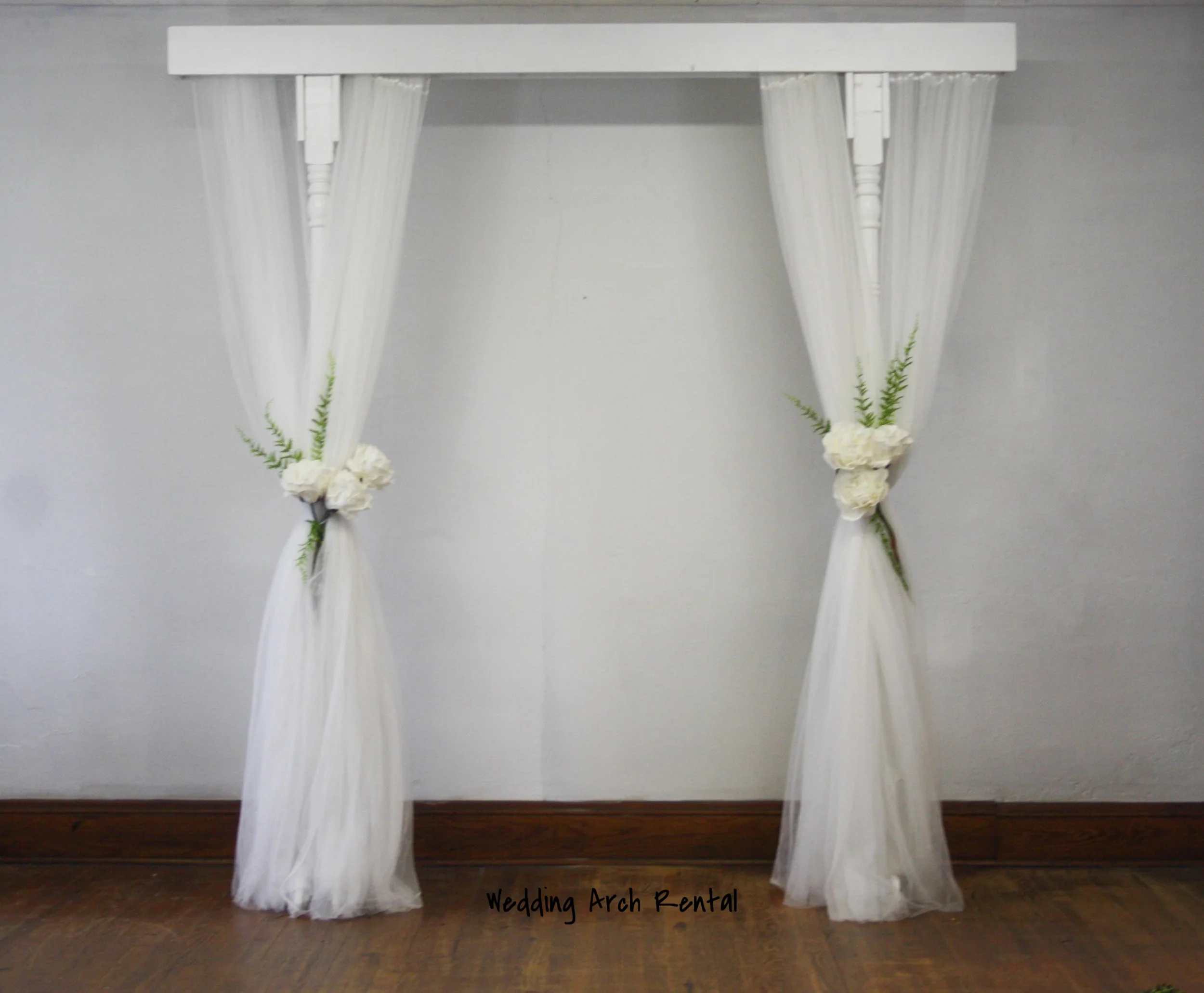 White Arch Rental with Draping