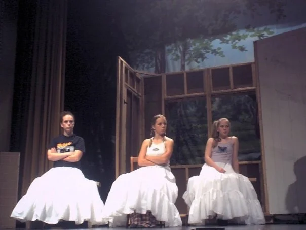 Holly Logan (pictured center) in "War for Toledo"