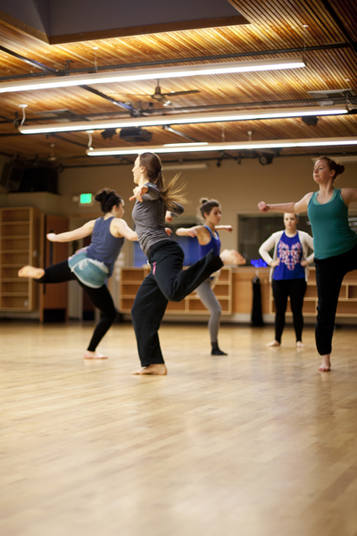 Artistic Director Holly Logan observes the group rehearsing "ODD Behaviors." Also pictured (from left to right): Dancers CarliAnn Forthun, Jessica Mego, Madeline Cameron & Lindsay Johns. Photo courtesy of S. Weissbach Photography .