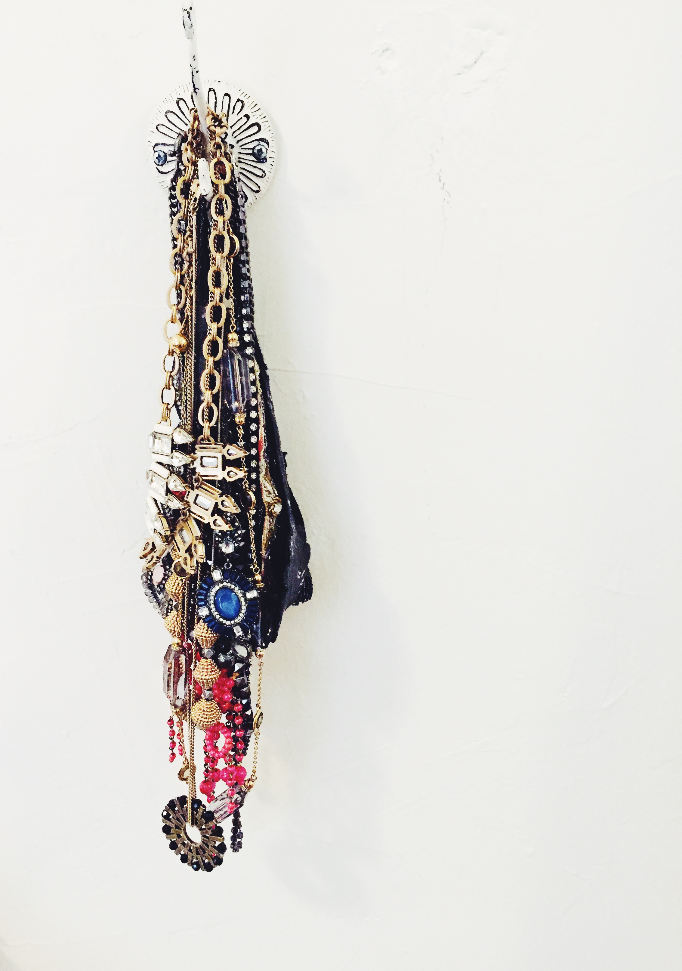 ^^ One of my projects today! I rehung this hook that fell out of my wall (oops) and now I'm using it to hang my necklaces and headbands. (Hook is from Anthropologie)