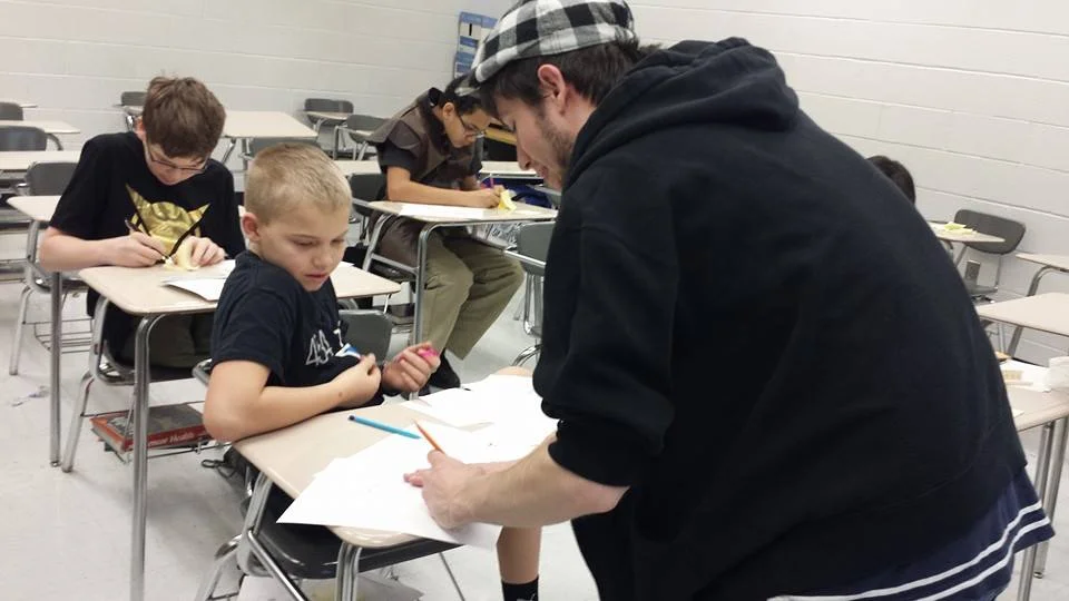 Jimmy instruction a student during Star Wars Days events. 