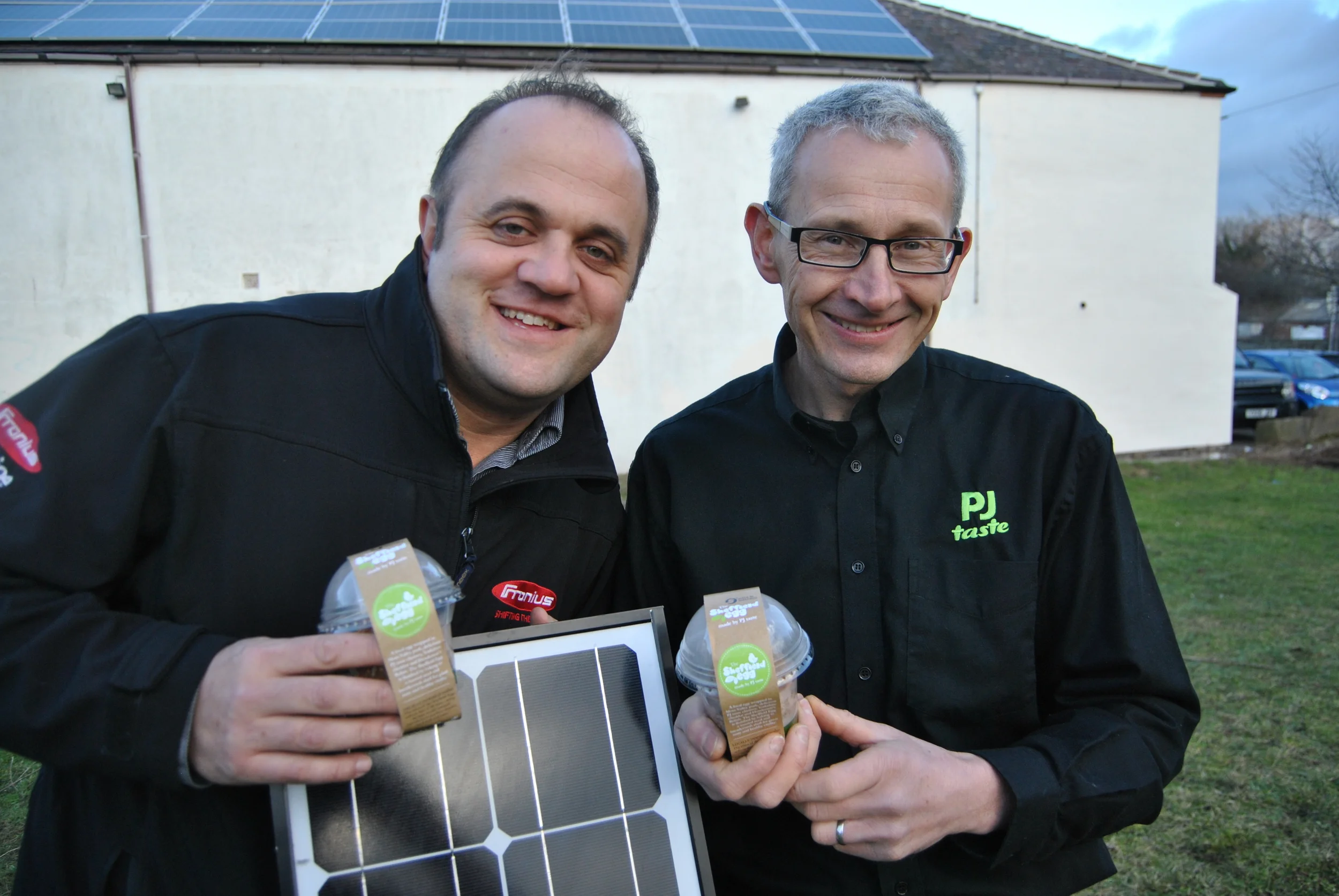 Rob Samuelson from jump energy and peter moulam at pj taste on the completion of the solar install - with our locally sustainable sheffield egg!