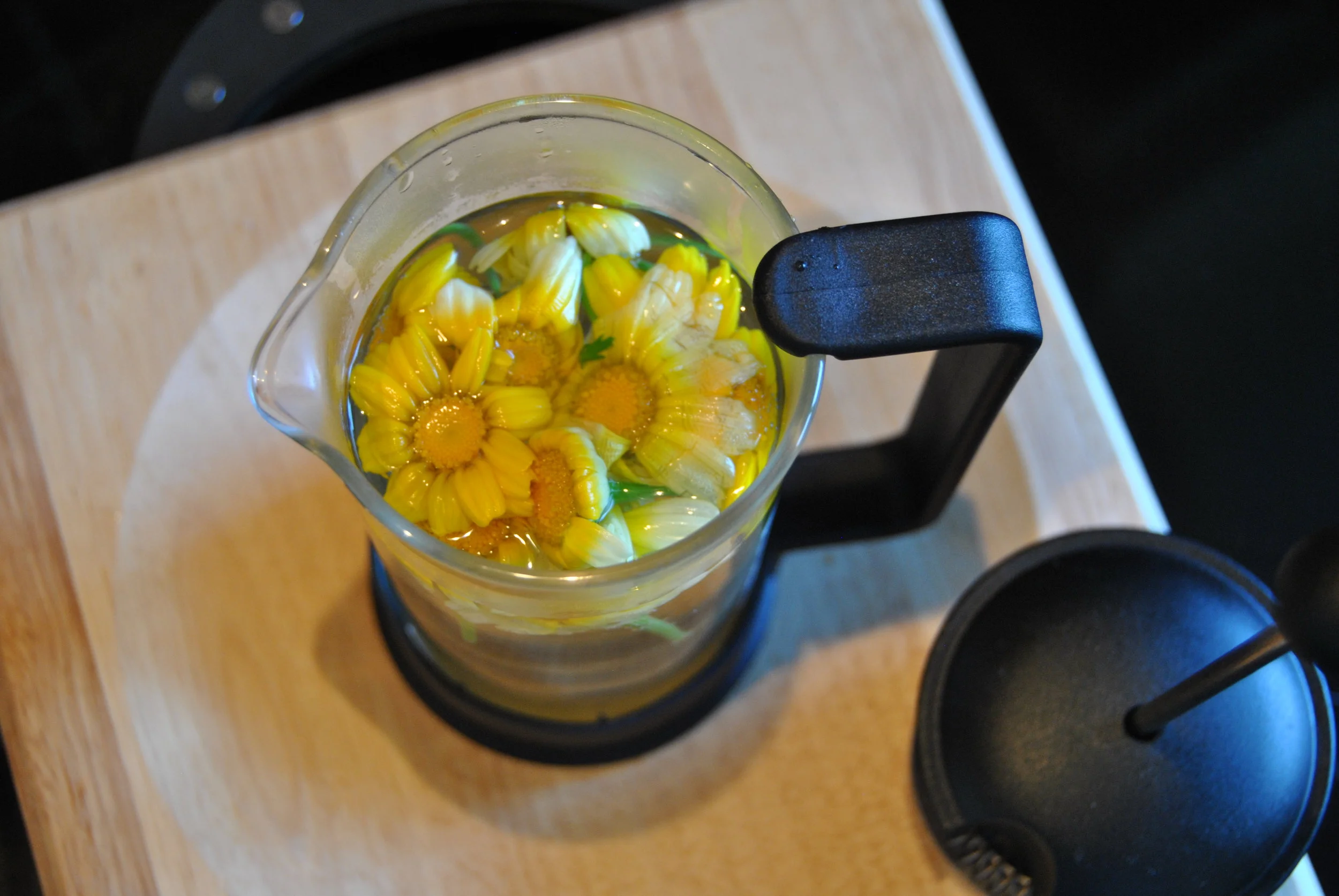 Chrysanthemum tea - a simple infusion of the flowers gives a golden brew