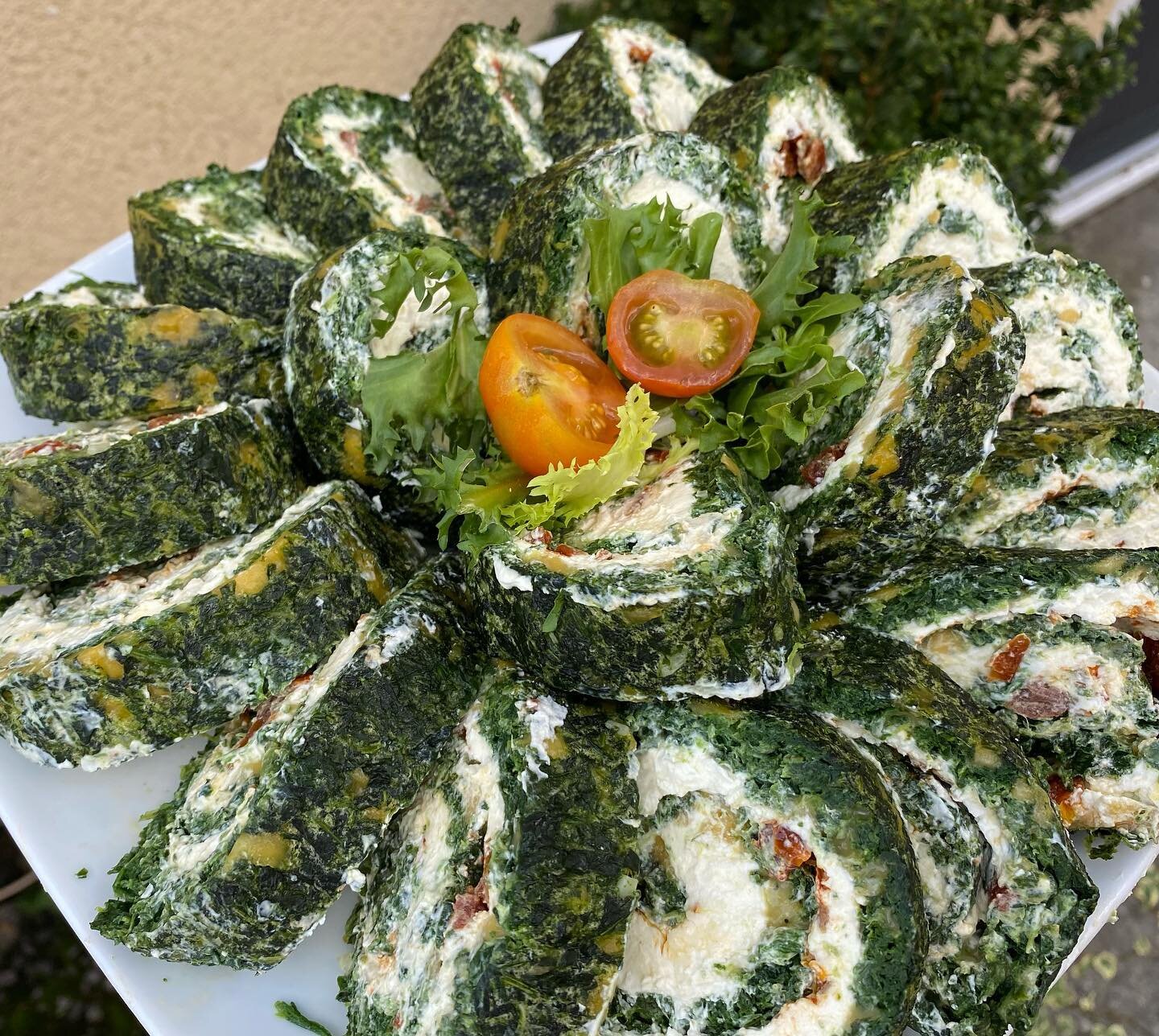 Spinach roulade with roasted local grown (Eckington) cherry tomatoes.

#caterer #localfood #partyfood