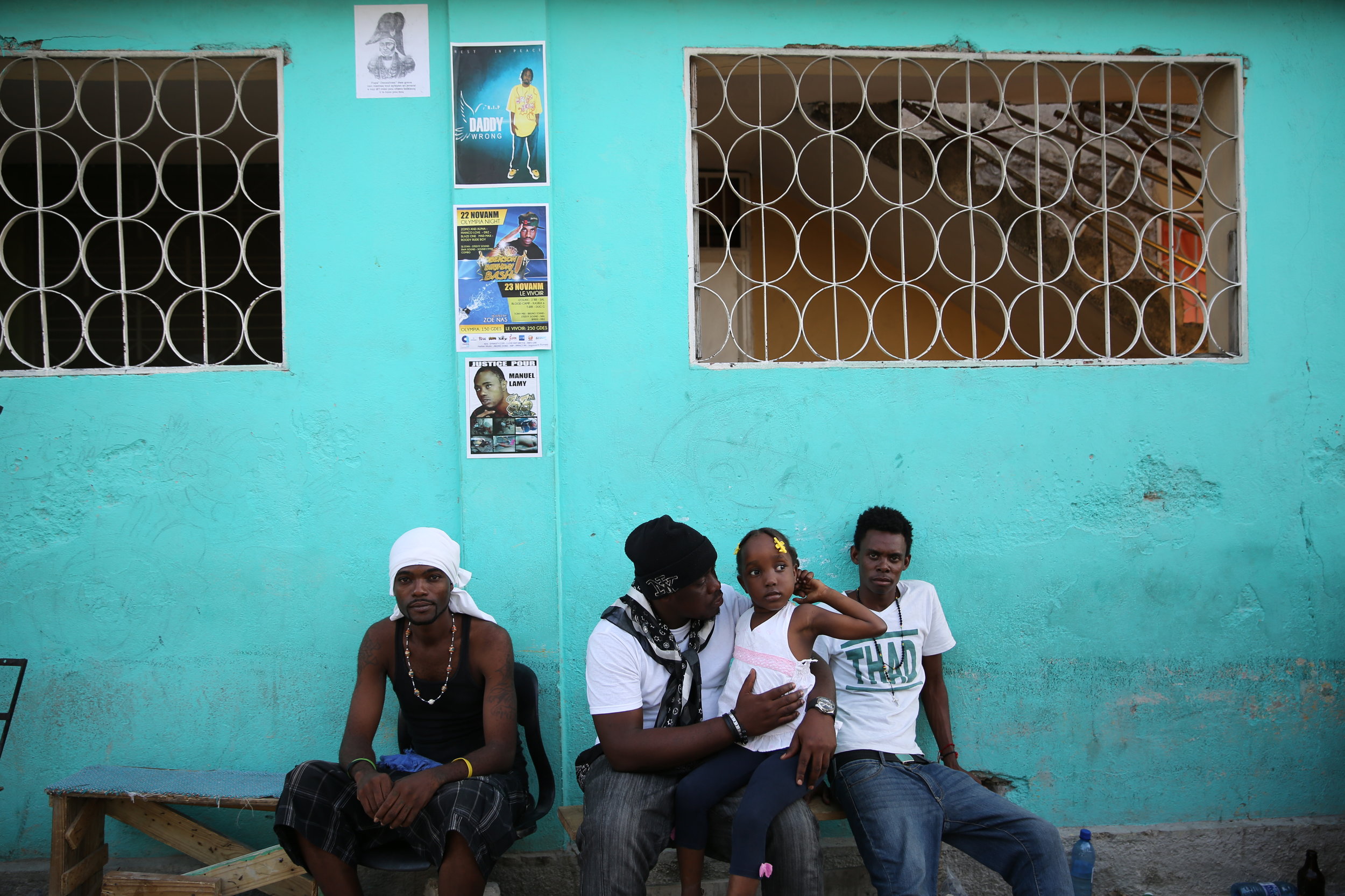  People of the Delmas 33 neighborhood in Port-au-Prince gathers for a wake organized by the deportee community. 