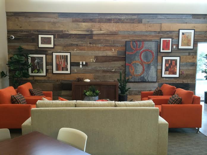 Our client just shared with us their gorgeous mixed reclaimed oak barn board paneling as an accent wall. The mixed colors & sizes of the reclaimed barn board adds texture, warmth & a unique style to their room. The custom design of placement of each piece of reclaimed wood paneling makes this wall its own work of art! Ben, Just wanted you to see the end result of our project. It turned out really great. Thanks. Julie Vice President Design ย