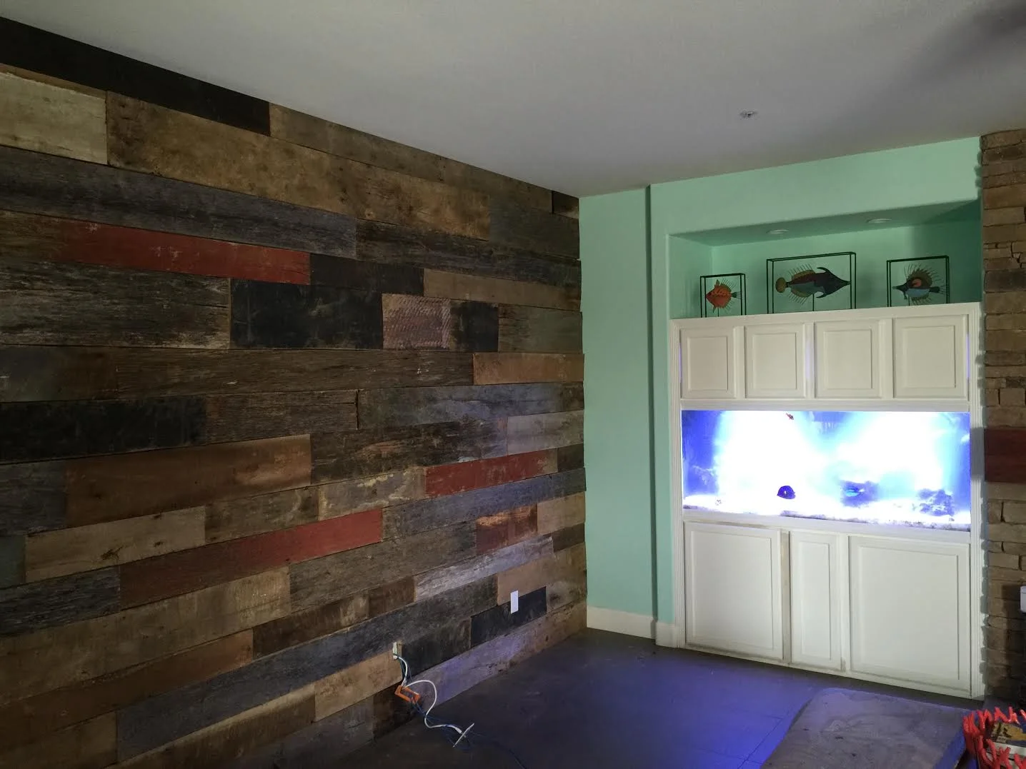 These customers came in on Saturday inquiring about doing an accent wall in their home with reclaimed wood barn boards. They went home, took measurements of the wall , e-mailed them to us, we sent them over an estimate & contact info of 3 installers we refer to our customers for installation, they came in on Tuesday to select their wood & by the end of the day Wednesday their plain wall looked like this! It is that simple to make any wall in your home a one of kind accent piece.