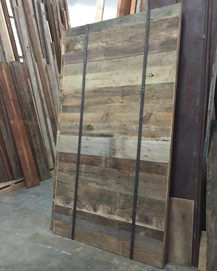 These custom designed & handcrafted reclaimed wood rolling track barn doors will be used as closet doors in new bedroom remodel. We can't wait to see a pic of them installed & hung in their new home! This modern design shows how versatile reclaimed wood can be. Barn doors are not just a rustic look they can be used in contemporary design as well & these turned out great!