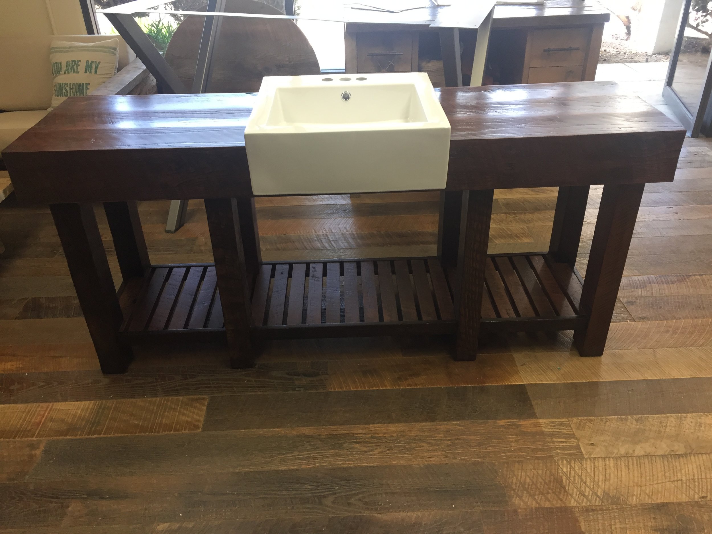 The talented U.S. Reclaimed team custom built this gorgeous vanity. Redesign your bathroom space with a custom vanity made with reclaimed wood. U.S. Reclaimed Vintage Lumber & Wood Works can create and design a vanity that is perfect for your space.