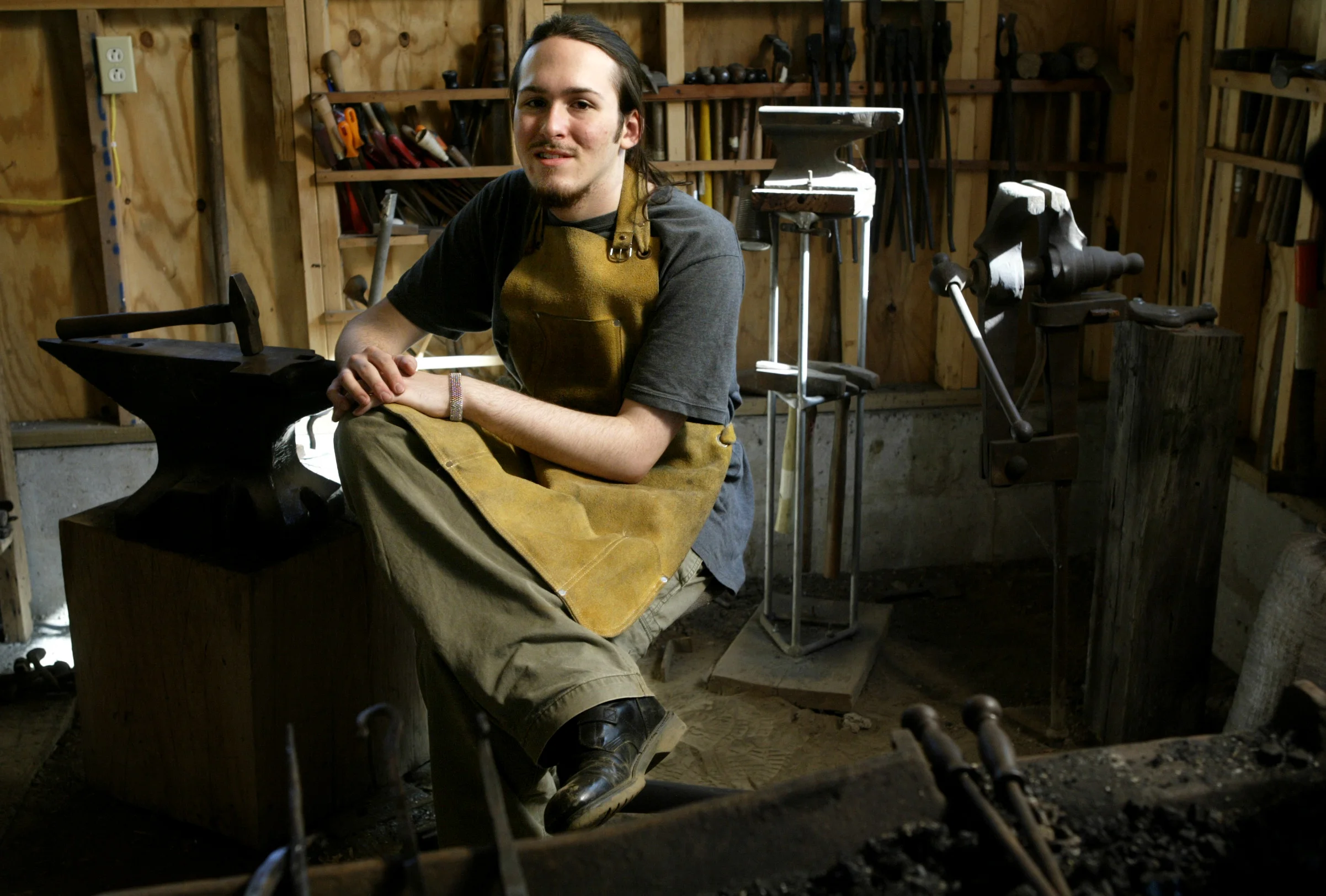  Jacksonville High School graduate Willis Hance, shown here in his home metalsmithing shop, has been selected as the Journal Courier's most promising art student. 
