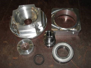 Parts eliminated by using a gearmotor. Weight and cost reduction.