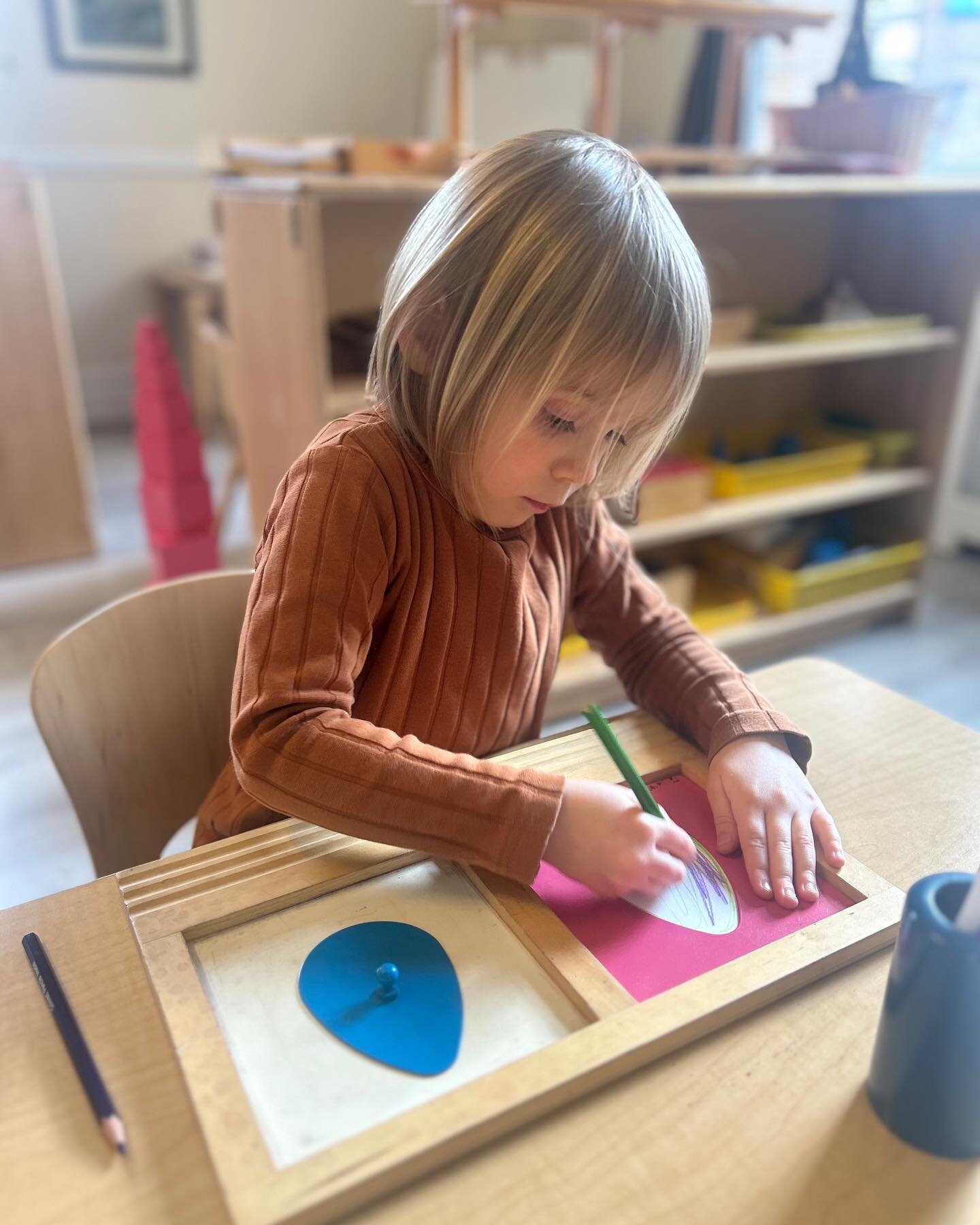 The goal of a Montessori classroom is to support children in their academic and personal independence - all while having fun! Some works on the Practical Life shelves in the Early Childhood classroom include pouring/transferring, beading, and cutting