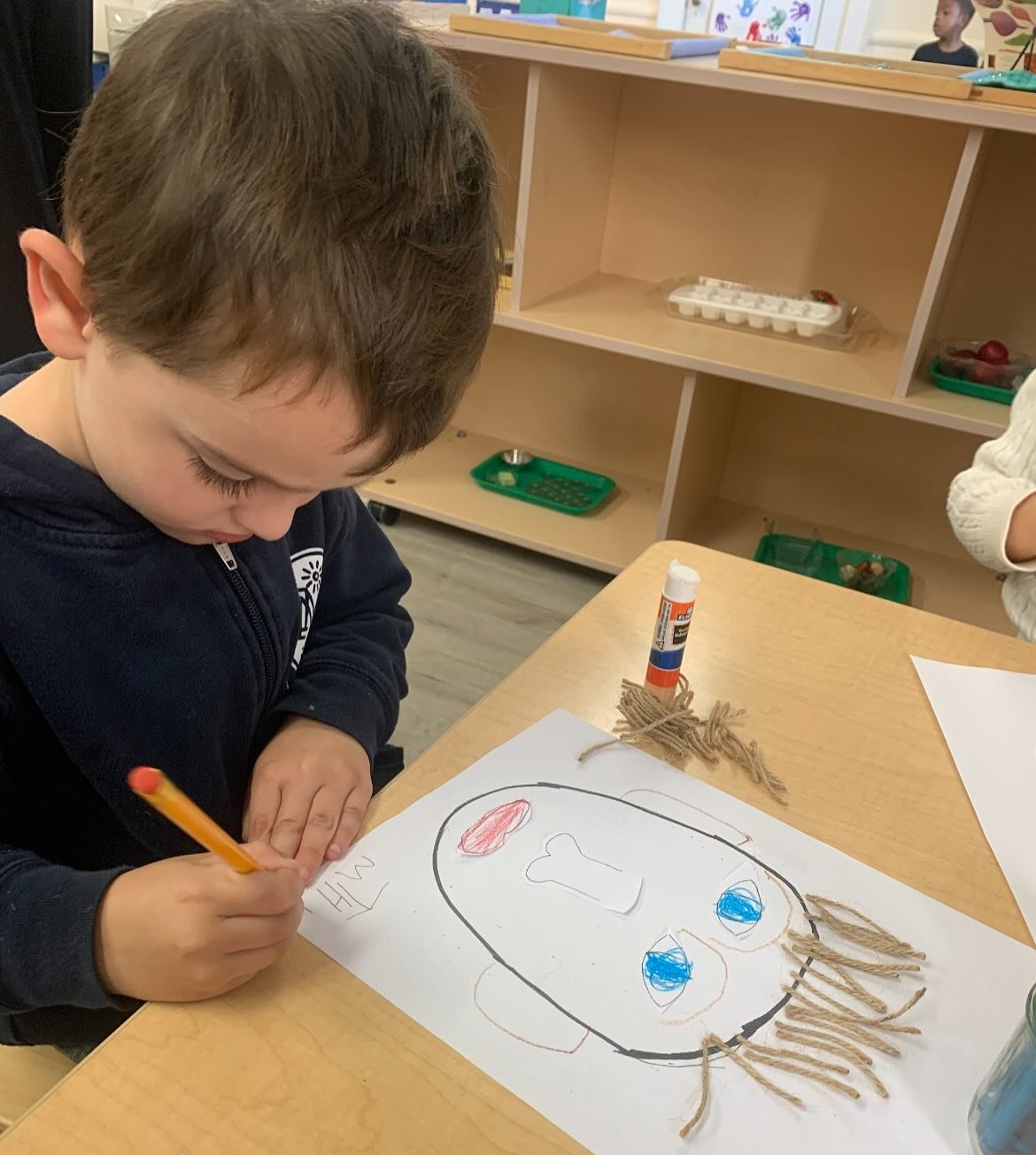 Our Early Childhood students have been working on self portrait collages using a variety of materials to construct their likeness. This project allowed the children to reflect on themselves creatively. During the activity they developed their fine mo