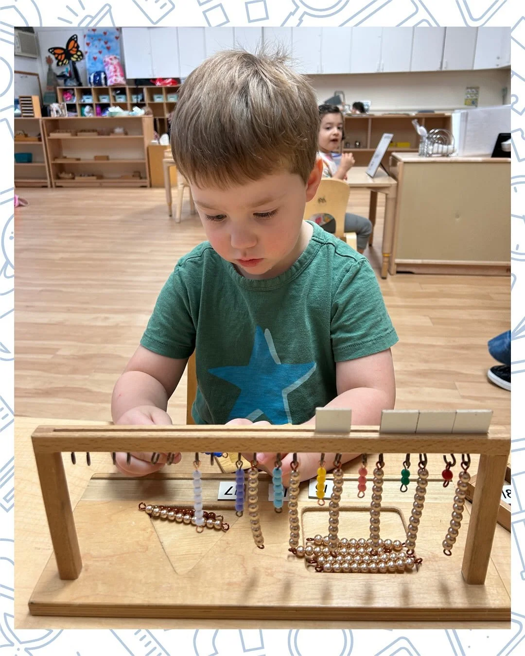 Some children in our Early Childhood Program were recently introduced to the Teen Hanging Bead Frame. This work provides a visual representation of the tens place with a golden 10 bead bar while colored bead bars of 1-9 represent the unit place. The 