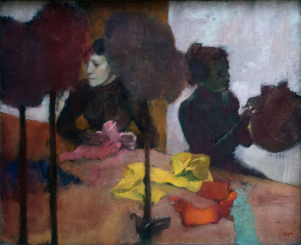 The Milliners, by Edgar Degas. Painted after Lizzie's time, this painting illustrates the milliners hard at work in a hat shop.