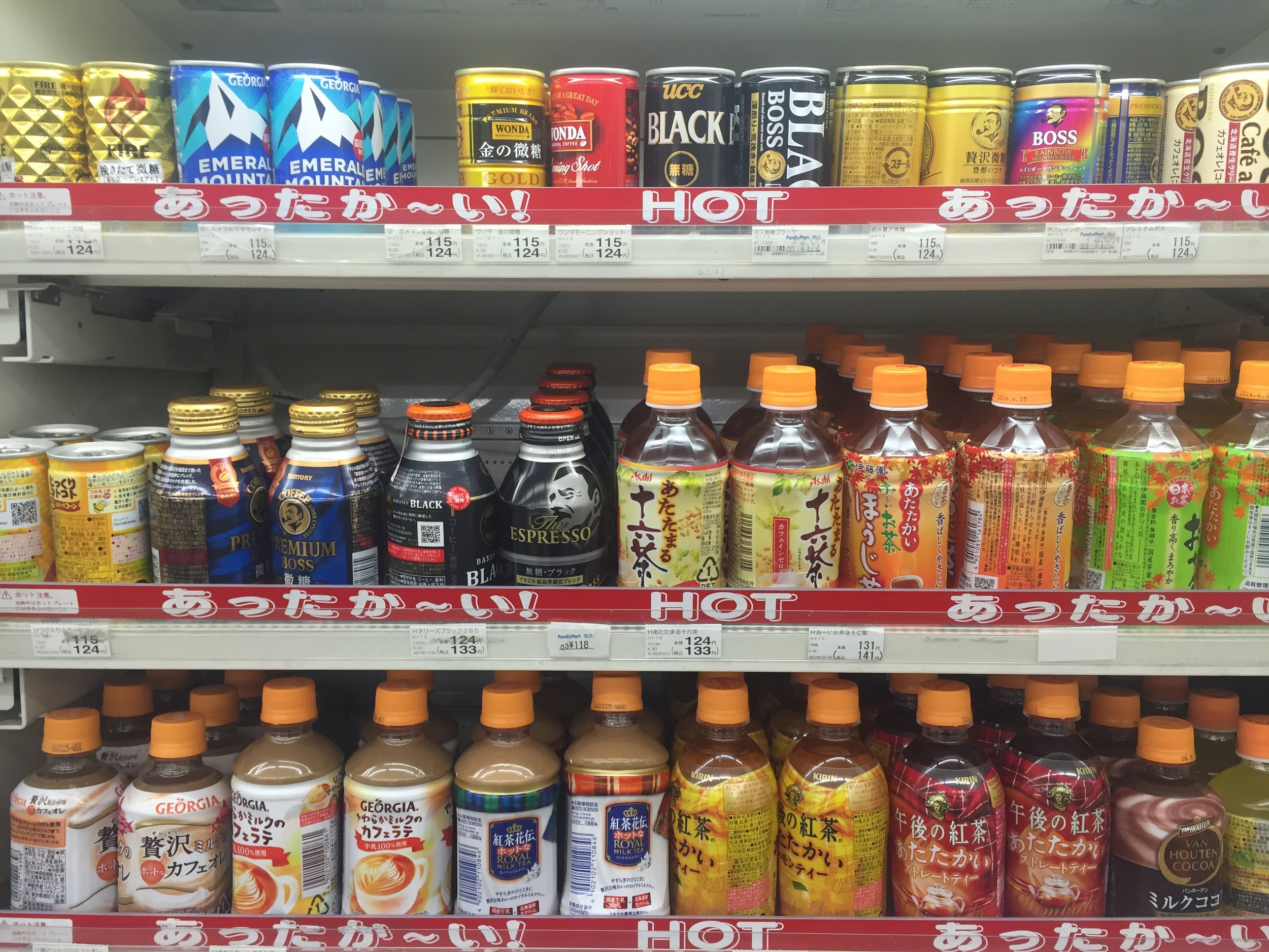 Hot coffee in a can or a plastic bottle. 