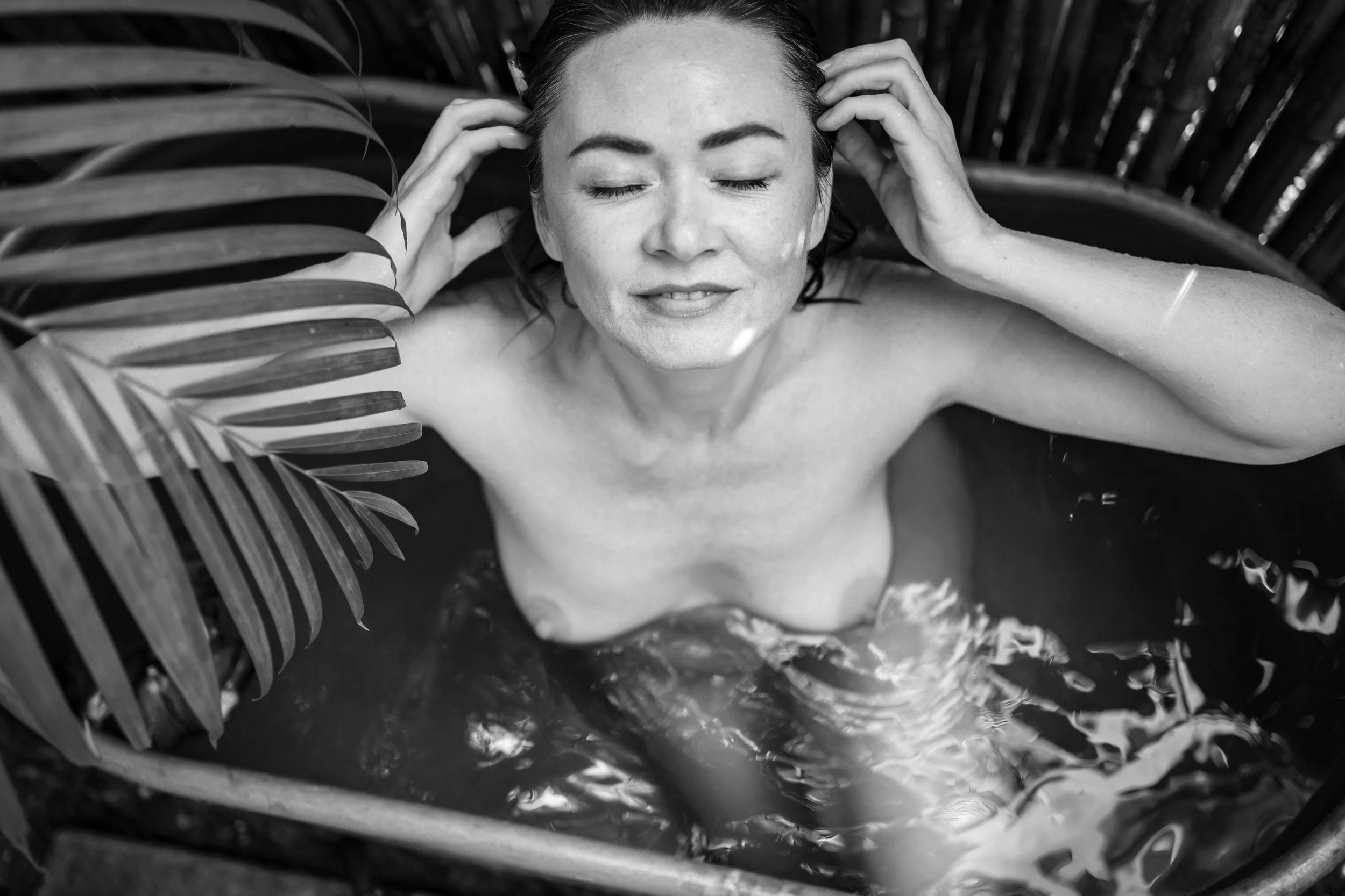 self-portraits in a tub outdoors