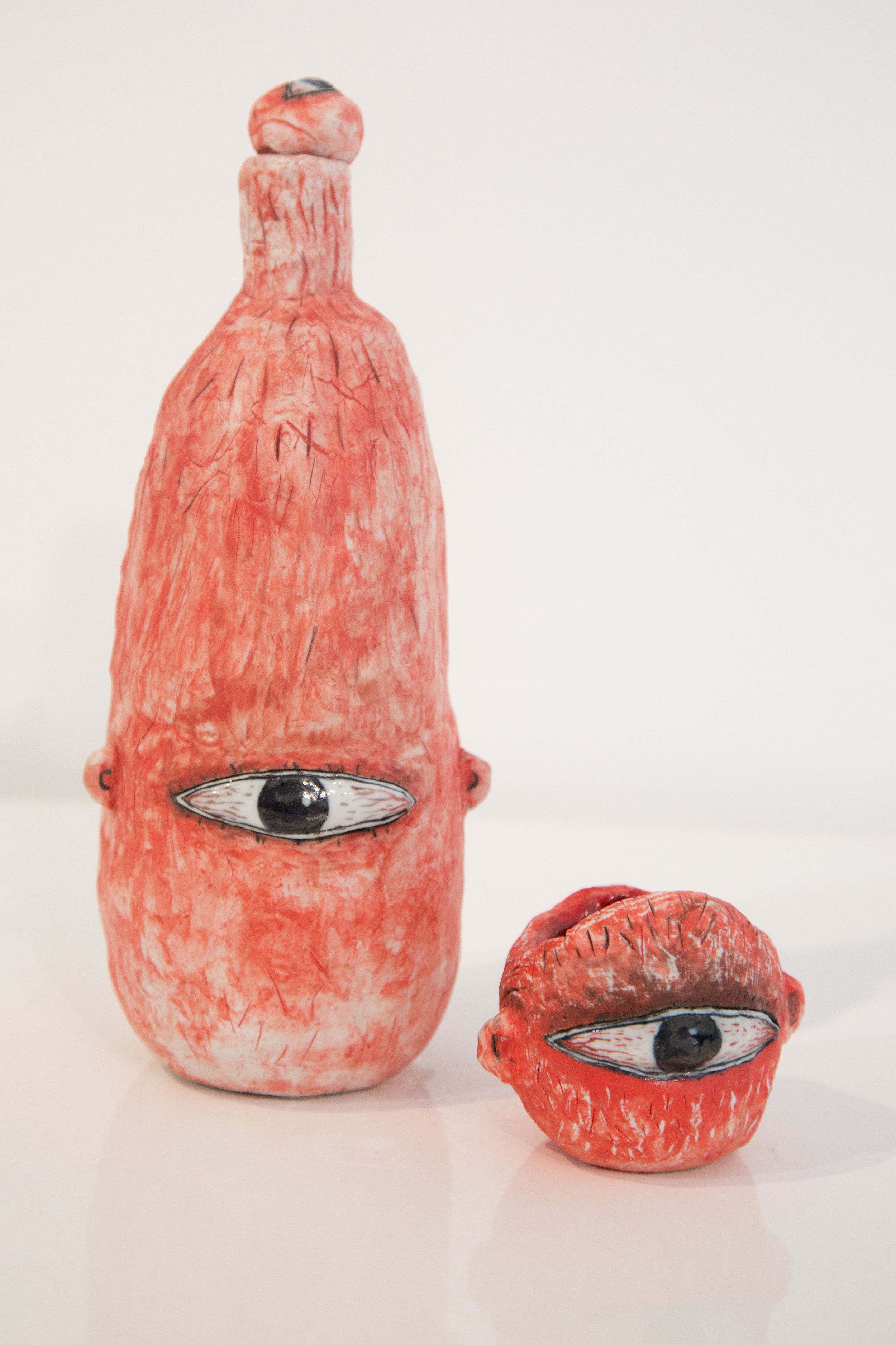   OKS   Head Bottle &amp; Cup (Guston Series) , 2014 Glazed porcelain Bottle: 10  1/2  x 4  1/2  x 4 in Cup: 3 x 3  1/2  x 2  3/4  in 