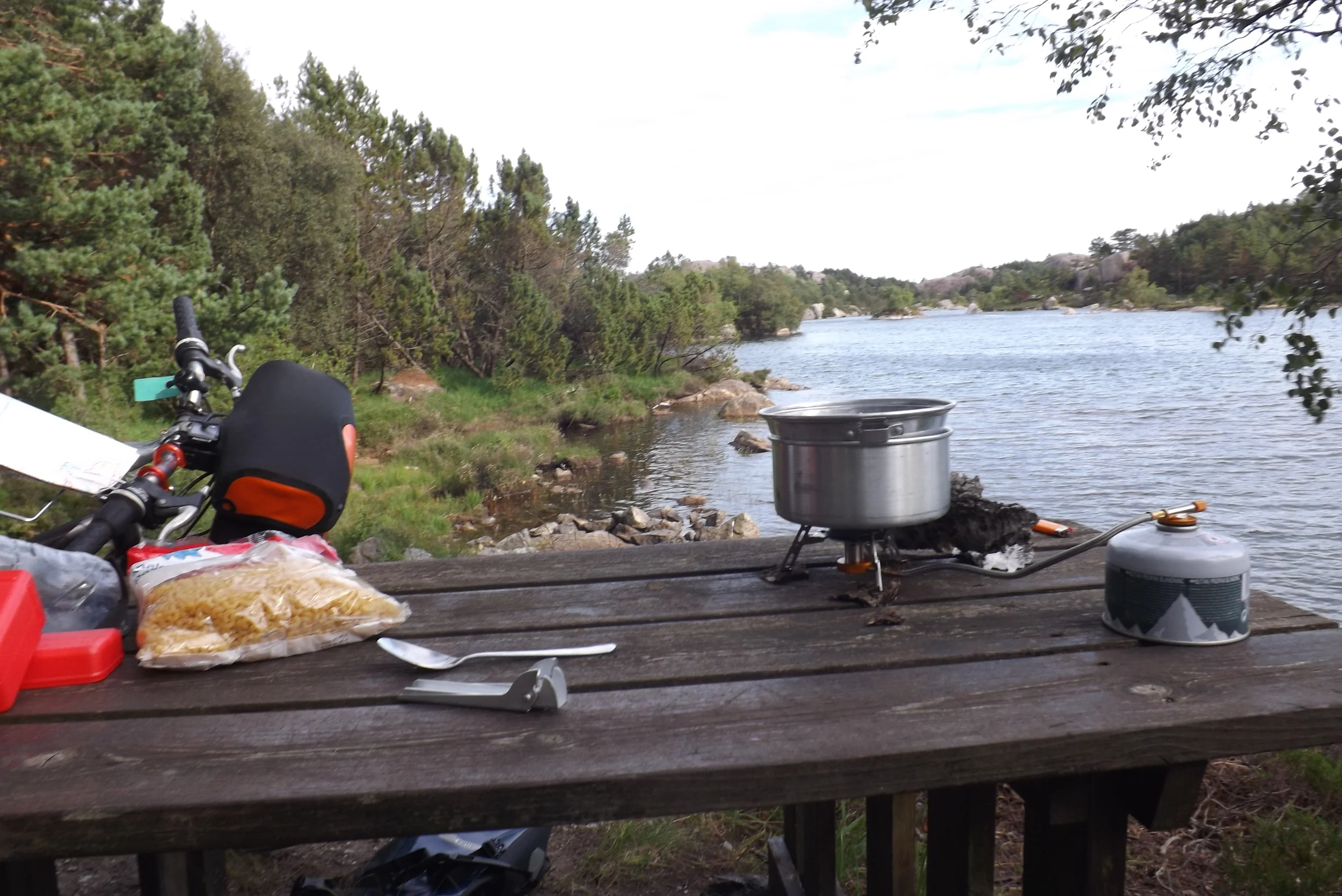  If I had always waited until I found a campsite to cook dinner, I would have been sometimes very hungry. Since I was carrying all my food and cooking equipment, sometimes it was just convenient to stop at a picnic table and cook before cycling on in