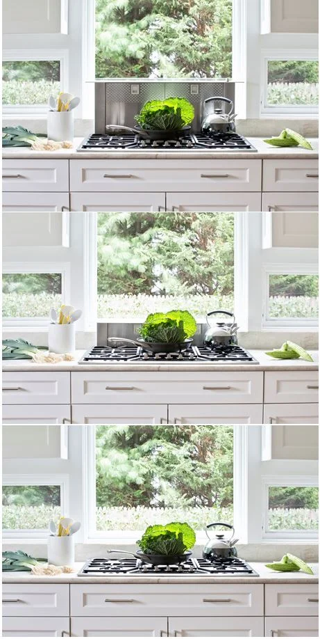  A Thermador cooktop includes a pop-up downdraft ventilation system that only appears when needed. Backsplash windows flood the countertops with natural light. 