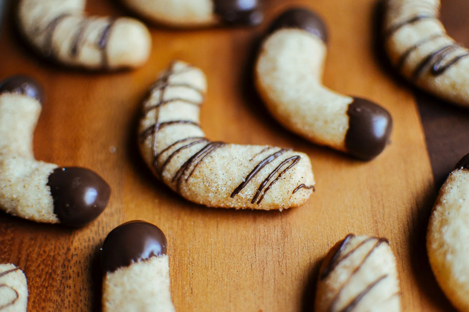 chocolatedipped almond crescent cookies — the farmer's daughter let's bake something