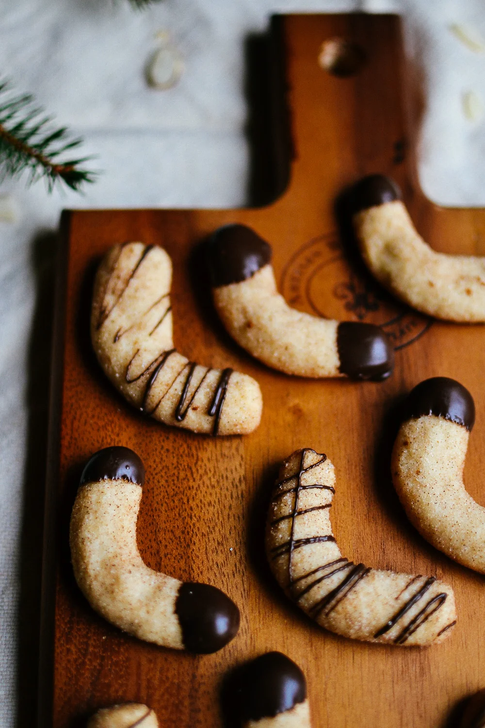 chocolatedipped almond crescent cookies — the farmer's daughter let's bake something