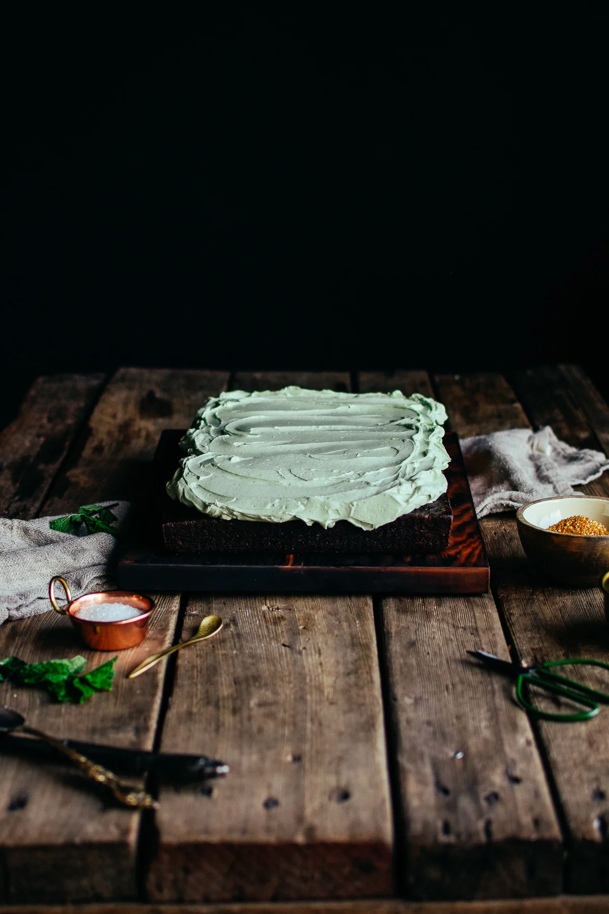 fresh mint frosting on a chocolate sheet cake subtle st. patrick's