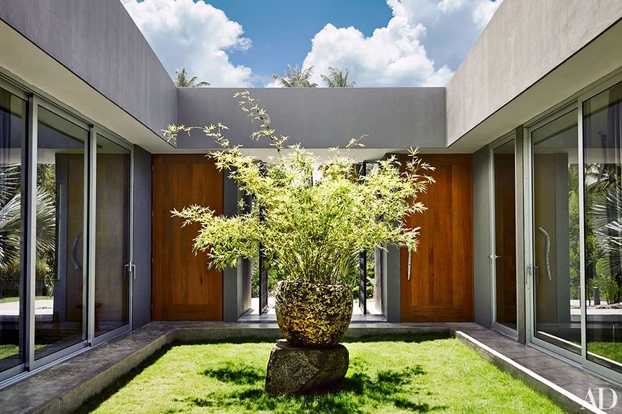 Central courtyards opens to interiors to create one large outdoor room.