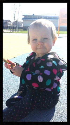 When Charlotte makes this face she's about to put something inedible in her mouth (in this case a leaf).
