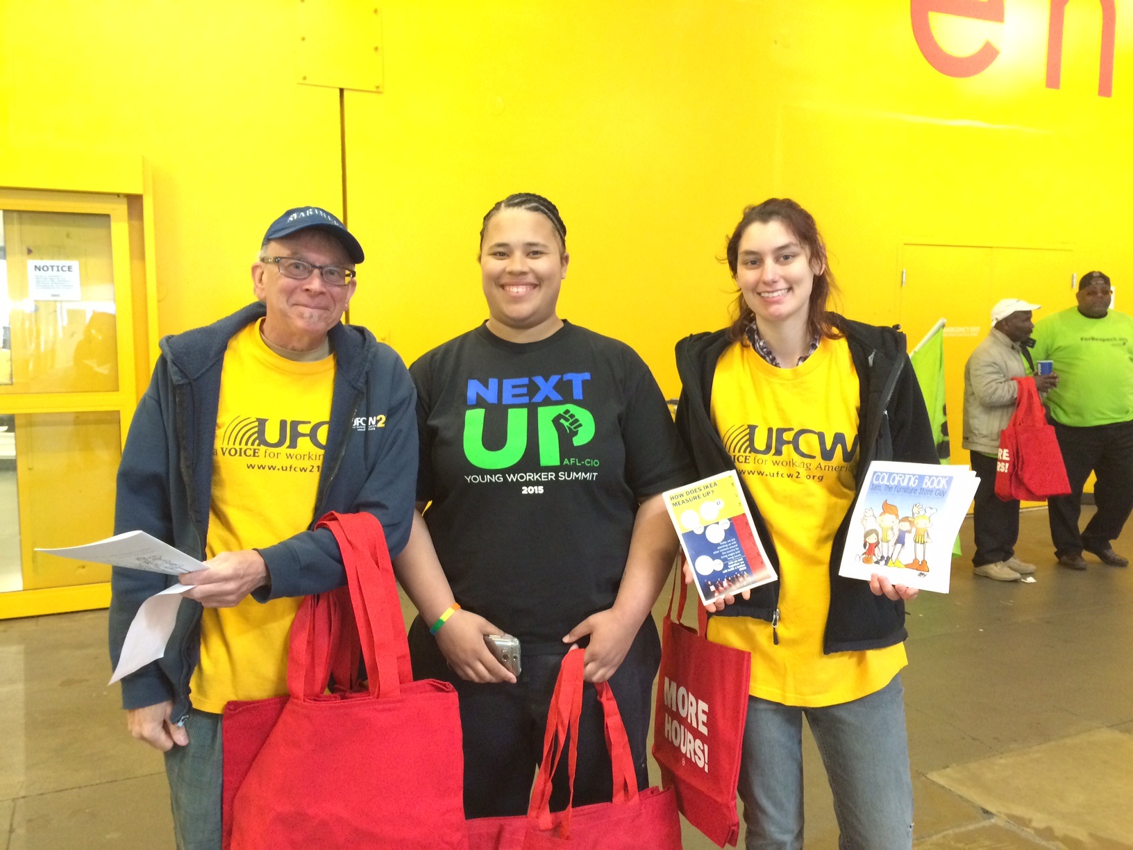 SAM CHASE (FAR RIGHT) WITH UFCW 21 MEMBERS AMES REINHOLD AND ARIANA DAVIS AT AN IKEA ACTION.