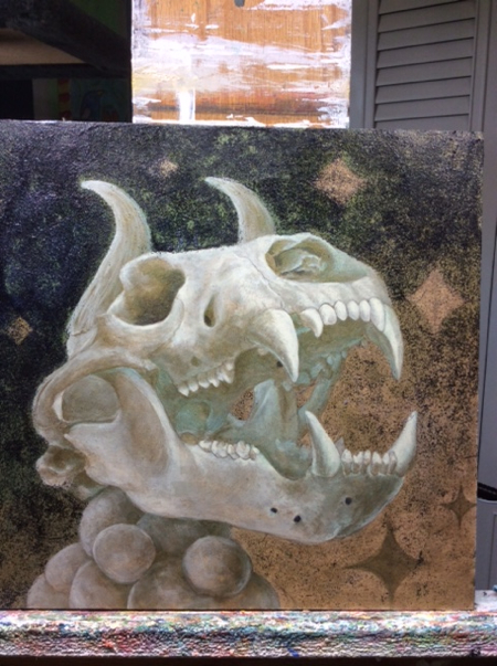 When I switched the horns around, i sanded the area, which left a strange glossy spot on the surface. I resolved this issue by adding a thin layer of black glitter. It covered that error and created a nice texture around the top of the skull.