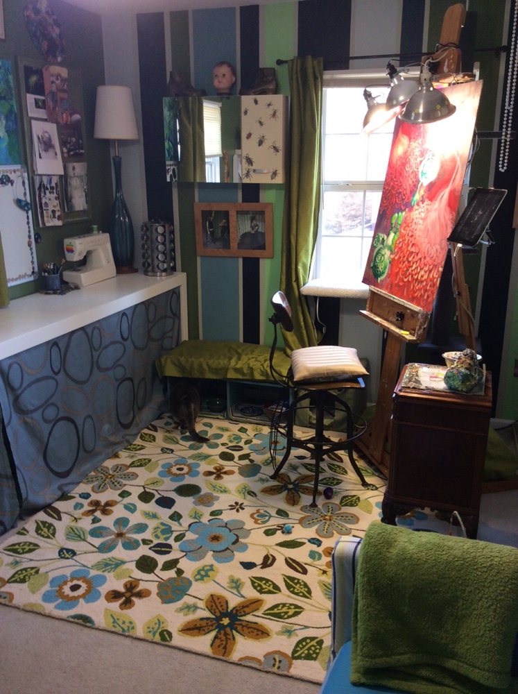 After countless hours and several trips to Decoy Art Studio, the studio is finished! The rug was my major splurge item. I must have looked at hundreds of rugs at all sizes and prices, but that one was PERFECT! The one thing I did not take into consideration was the fact that it is looped wool, which our kitten, Boo, says makes for a lovely scratching surface. Sigh…