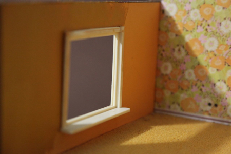 I was able to keep the flower wallpapered accent wall in this room by sealing it with gloss medium. I slightly altered the other walls by painting them a more muted shade of yellow ochre and also sealing them. This is the one room with the original carpet and it is in pretty nice shape, so I am going to keep it too.