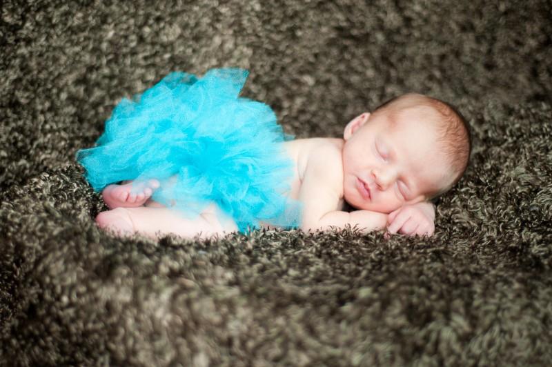 Her amazingly talented Aunt Jeni took this picture of her in her teal tutu. I think it is the perfect image to hang over the sofa in what is quickly becoming the teal/green Dip Room.
