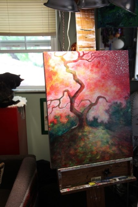 Tobin supervising my progress from her window perch. I am working on one of my favorite areas on the painting, the upper right corner. I had asked about using glitter on the piece, and was nicely told to hold the glitter. I enjoy working with people on commission pieces because it challenges me to go outside my comfort zone, etc., but the more I stared at that upper right corner the more I knew it NEEDED glitter. One evening, agonizing over the situation, Mark turned to me and said "Stop being a pussy and put glitter on it!" After I recovered from my fits of laughter, the red glitter began to flow and I was very happy. On top of that surface, I painted the cell forms so that the glitter became pulsing lines of color peeking around the opaque paint. When I presented the piece, I explained the situation and they immediately said they loved the glitter, so my little glitter rebellion paid off.