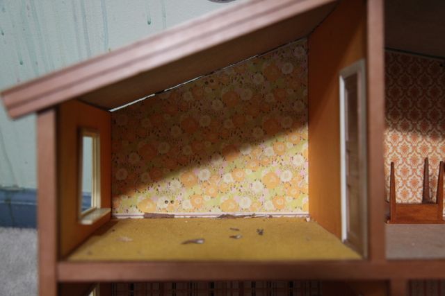 After removing the orange carpet in the Dip Room, I am thinking that the yellow carpet in the Sunny C room may get to stay. That stuff is seriously glued down!