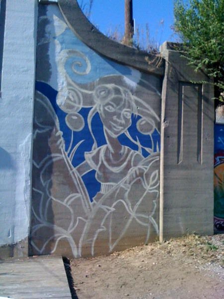 I begin blocking in the background. The patched areas are where rebar was exposed. Thank you Garden Station volunteers for patching and sealing the wall for me!